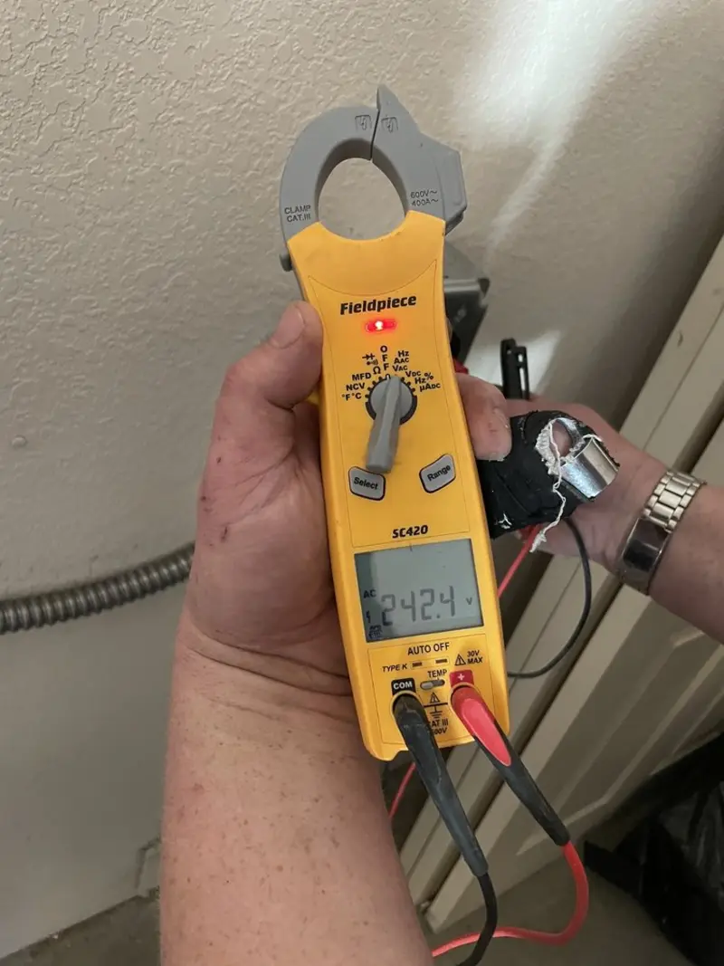 Voltage testing with clamp meter during Ceiling Fan Installation in Buffalo